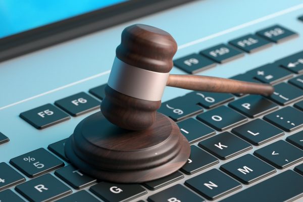 Online auction, law gavel on computer keyboard, banner, 3d illustration